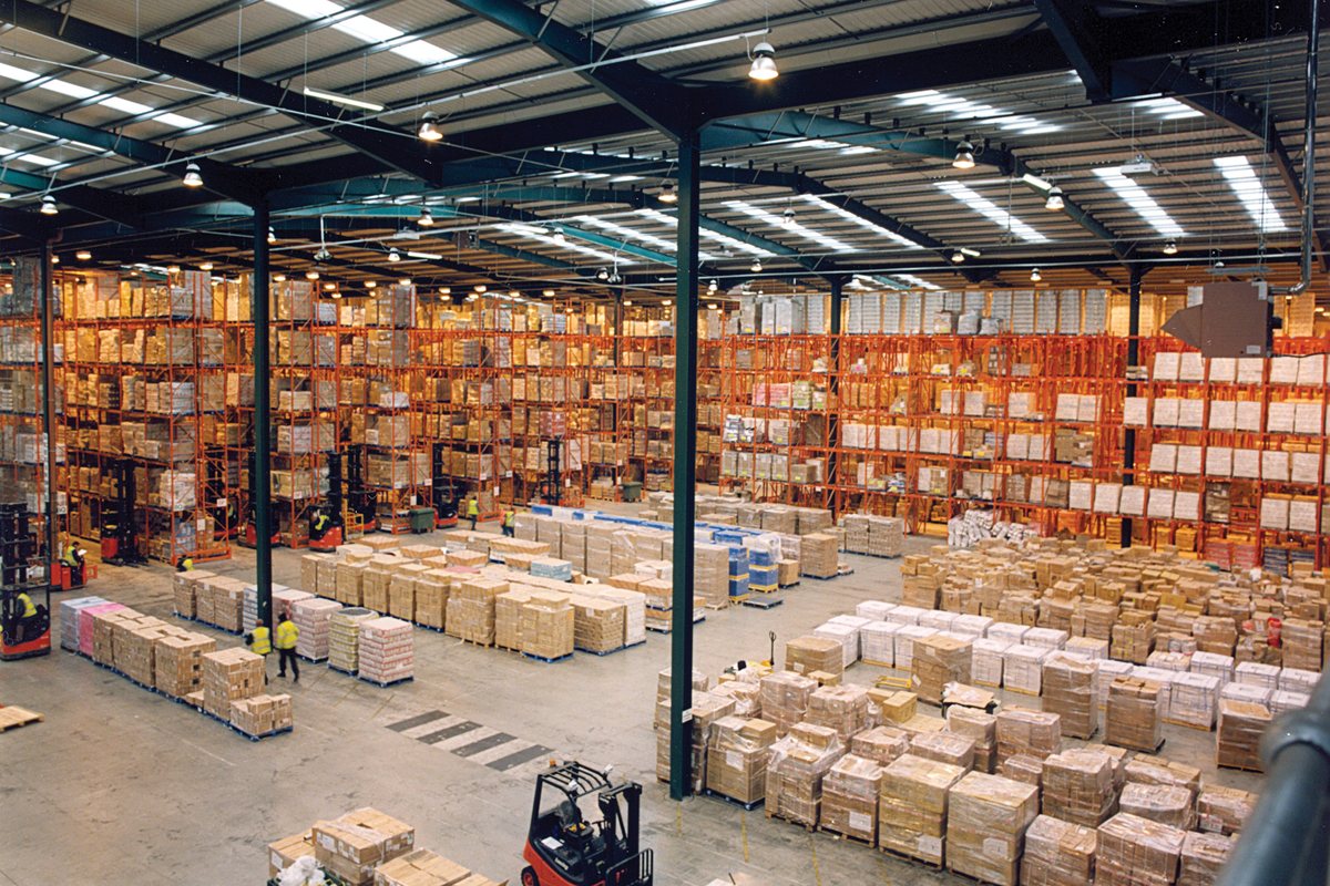 Courex warehouse facility with high-density pallet racks and staging